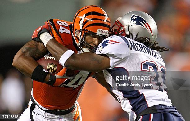 Houshmandzadeh of the Cincinnati Bengals runs with the ball against Brandon Meriweather of the New England Patriots on October 1, 2007 at Paul Brown...