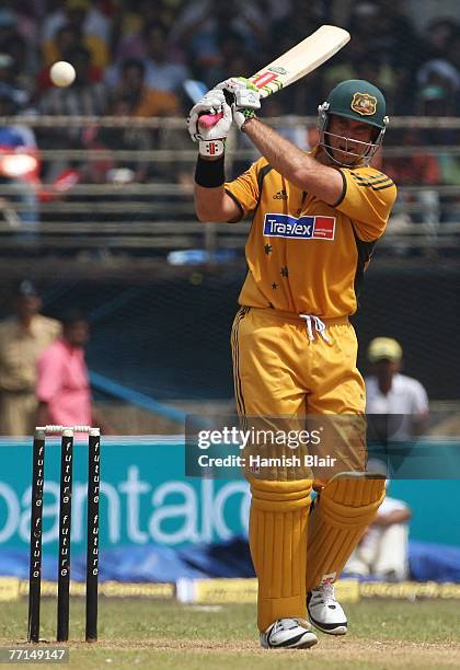 Matthew Hayden of Australia hits to mid-on during the second one day international match between India and Australia at the Jawaharlal Nehru Stadium...