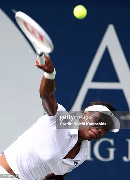 Venus Williams of USA serves against Jill Craybas of USA during day two of the AIG Japan Open Tennis Championships held at Ariake Colosseum on...