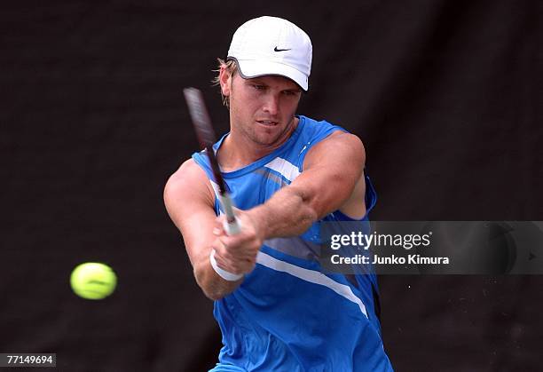 Robert Kendrick of USA hits a return shot against Hyun-Woo Nam of Korea during day two of the AIG Japan Open Tennis Championships held at Ariake...