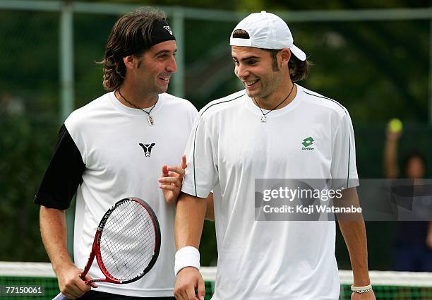 Simone Bolelli of Italy and Sergio Roitman of Argentina celebrate during their match with Teimuraz Gabashvili of Russia and Vincent Spadea of USA...