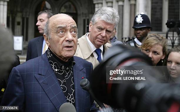 Mohamed Al Fayed and his press officer Michael Cole arrive at London's High Court, 02 October 2007, as the formal inquest into the deaths of Princess...