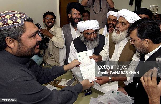 Pakistani members of the Baluchistan Provincial Assembly present their resignation letters to Speaker of the assembly Jamal Shah Kakar in Quetta, 02...