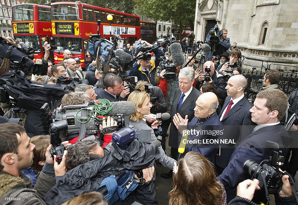 Mohamed Al Fayed (3rd R) leaves London's