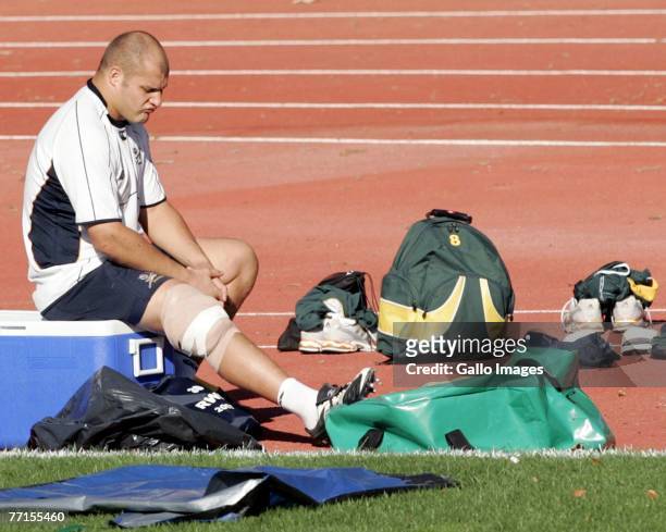 Van der Linde of South Africa sits down injured during the South Africa training session at the Stade Jean Bouin on October 2, 2007 in Marseille,...