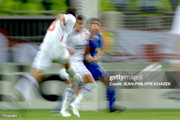 Lyon's midfielder Juninho Pernambucano shoots during their UEFA Champions League Group E match against Glasgow Rangers at Gerland' Stadium, in Lyon,...