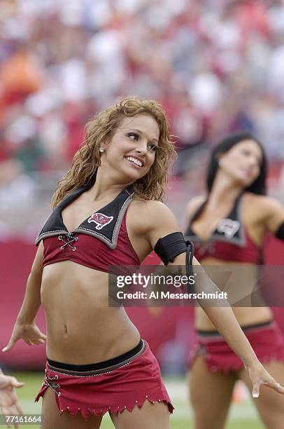 Cheerleader of the Tampa Bay Buccaneers entertains during play against the St. Louis Rams at Raymond James Stadium on September 23, 2007 in Tampa,...