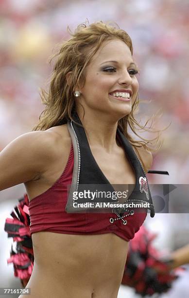 Cheerleader of the Tampa Bay Buccaneers entertains during play against the St. Louis Rams at Raymond James Stadium on September 23, 2007 in Tampa,...
