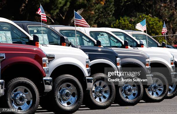 Brand new Ford trucks are seen on display at a Ford delership October 2, 2007 in Colma, California. Ford reported today a 21 percent decline in...