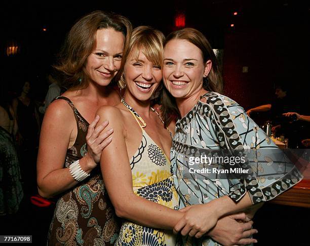Castmembers actresses Clare Carey, Ashley Scott and Sprague Grayden pose at the party for the CBS DVD release of "Jericho The First Season" at the...