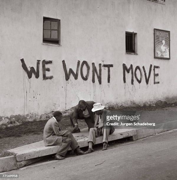 The slogan 'We Won't Move' appears on a wall in Sophiatown, a suburb of Johannesburg, 1955. In 1955, the Group Areas Act allowed the government to...