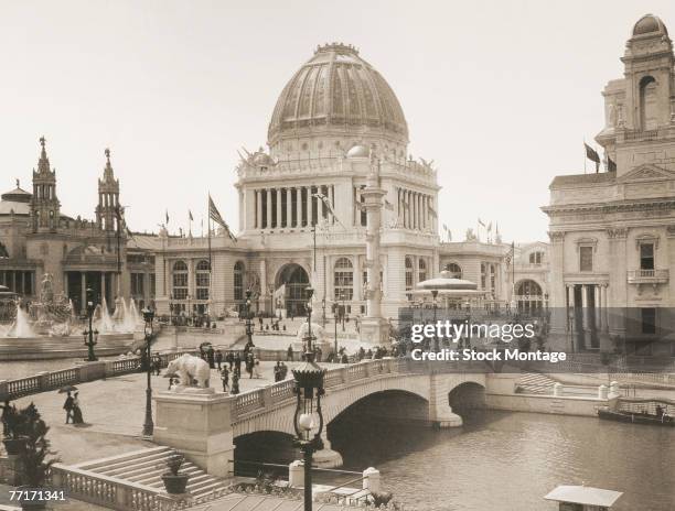 View of the Administration Building, as seen beyond a bridge over the Basin in the White City section of World's Columbian Exposition. Chicago,...