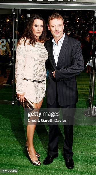 Actor John Simm and his partner, actress Kate MacGowan arrive at the UK premiere of Stardust at the Odeon Leicester Square on October 3, 2007 in...