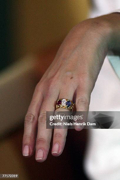 Marie Cavallier shows her engagement ring during a press conference attended with Prince Joachim of Denmark to announce their engagement, at the...