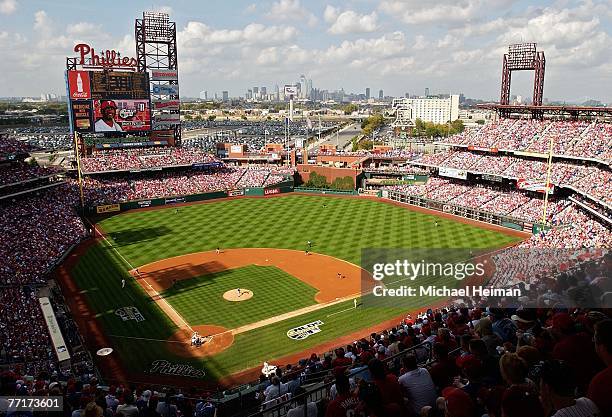 Starting pitcher Jeff Francis of the Colorado Rockies pitches to Jimmy Rollins of the Philadelphia Phillies in the first inning of Game One of the...