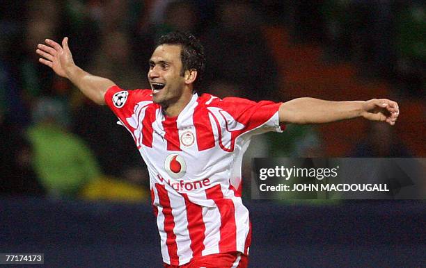 Olympiacos' defender Christos Patsatzoglou celebrates after scoring during the during the Champions League group C match Weder Bremen vs. Olympiacos...