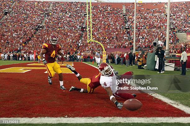 Brandon Gibson of the Washington State Cougars looses the ball in the endzone during the game against the USC Trojans on September 22, 2007 at the...