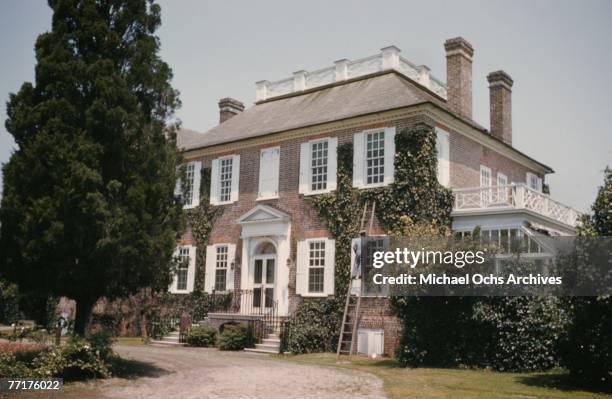 An antebellum plantation house circa mid 1930's in the deep south.