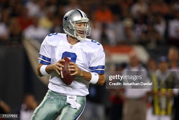 Quarterback Tony Romo of the Dallas Cowboys looks to pass against the Chicago Bears at Soldier Field on September 23, 2007 in Chicago, Illinois.