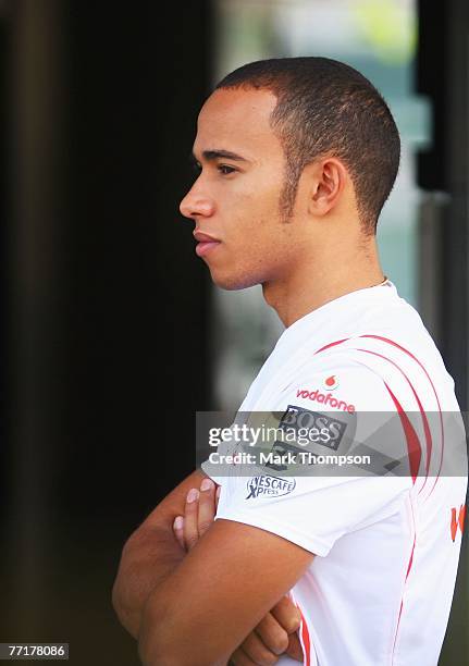 Lewis Hamilton of Great Britain and McLaren Mercedes is seen in the paddock during previews prior to the Chinese Formula One Grand Prix at the...