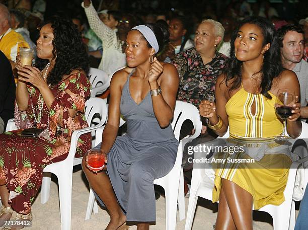 Actress Lynn Whitfield, actress Regina King and actress Gabrielle Union enjoy the O'Jays performance at the first night of the Bermuda Music Festival...