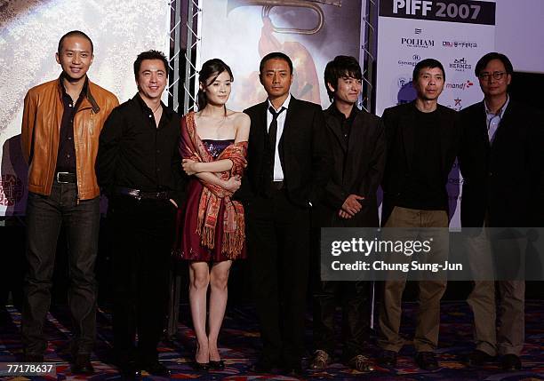 Actor Deng Chao, producer Wang Zhonglei, actress Tang Yan actor Zhang Hanyu, Yuan Wenkang and film director Feng Xiaogang attend a photocall at the...