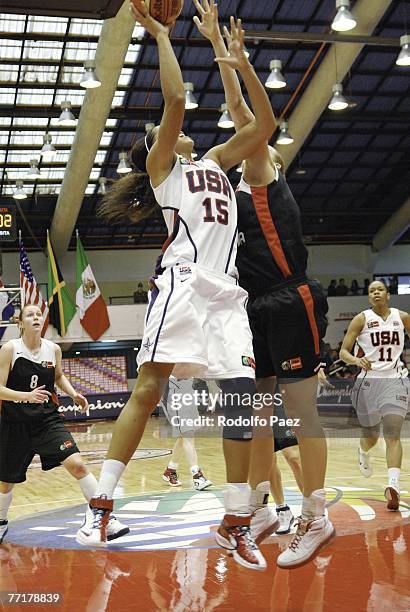 Jordan Ashley Adams of Canada tries to block Candace Parker of USA during the Womens FIBA Americas Championship at the Arena on September 28, 2007 in...