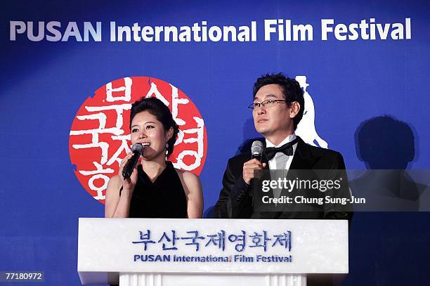 Actress Moon So-Ri and Director Jang Joon-Hwan attend the opening ceremony of the 12th Pusan International Film Festival on October 4, 2007 in Pusan,...