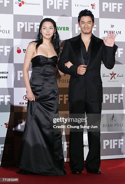 Actress Park Si-Yeon and Ju Jin-Mo arrive at the opening ceremony of the 12th Pusan International Film Festival on October 4, 2007 in Pusan, South...