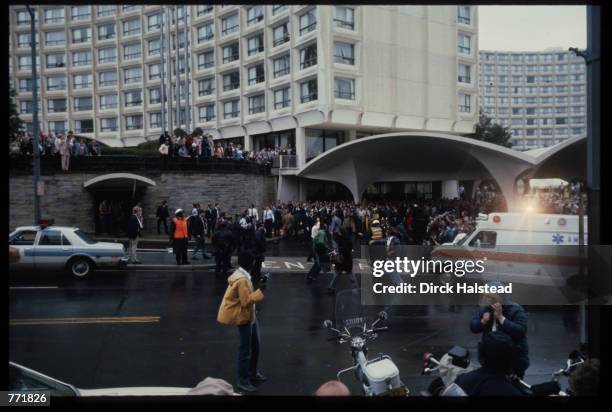 View of the chaos immediately after the assassination attempt on President Ronald Reagan outside the Washington Hilton Hotel, Washington DC, March...