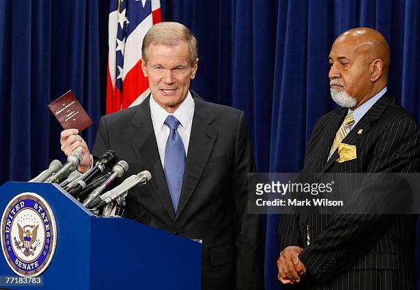 Sen. Bill Nelson speaks while flanked by Rep. Alcee Hastings during a news conference about the 2008 Florida presidential primaries on Capitol Hill,...