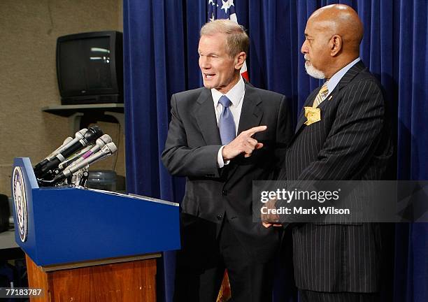 Sen. Bill Nelson speaks while flanked by Rep. Alcee Hastings during a news conference about the 2008 Florida presidential primaries on Capitol Hill,...