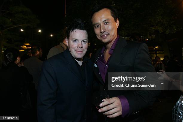 Director John Radel and producer Robin Leong attend the opening ceremony party for the 12th Pusan International Film Festival October 4, 2007 in...