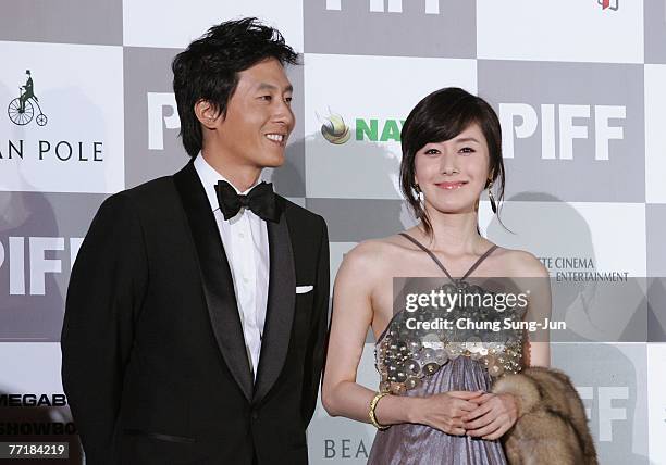 Actor Kim Joo-Hyuk and actress Kim Ji-Soo arrive at the opening ceremony of the 12th Pusan International Film Festival October 4, 2007 in Pusan,...