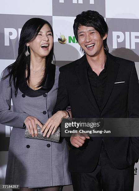 Actress Lee Ji-Yeon and actor Lee Dong-Gyu arrive at the opening ceremony of the 12th Pusan International Film Festival October 4, 2007 in Pusan,...