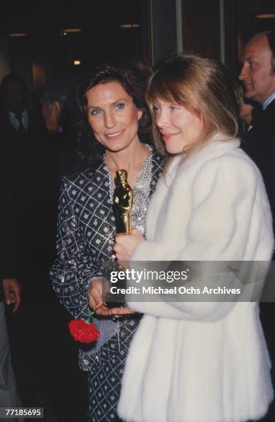 Country singer Loretta Lynn poses for a portrait with Sissy Spacek at the Academy Awards Ceremony which was held on March 31, 1981 at the Dorothy...