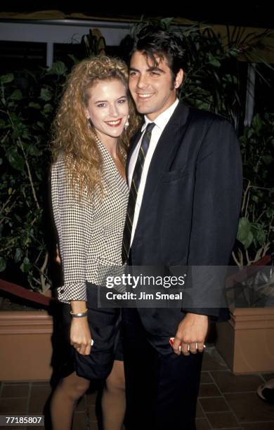 Kelly Preston and George Clooney