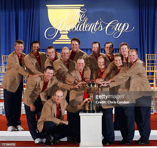 The U.S. Team poses with the President's Cup after defeating the International Team 19.5 to 14.5) during the Closing Ceremony of The Presidents Cup...