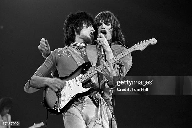 Guitarist Ronnie Wood and singer-frontman Mick Jagger perform with The Rolling Stones at the Omni Coliseum on July 30, 1975 in Atlanta, Georgia.