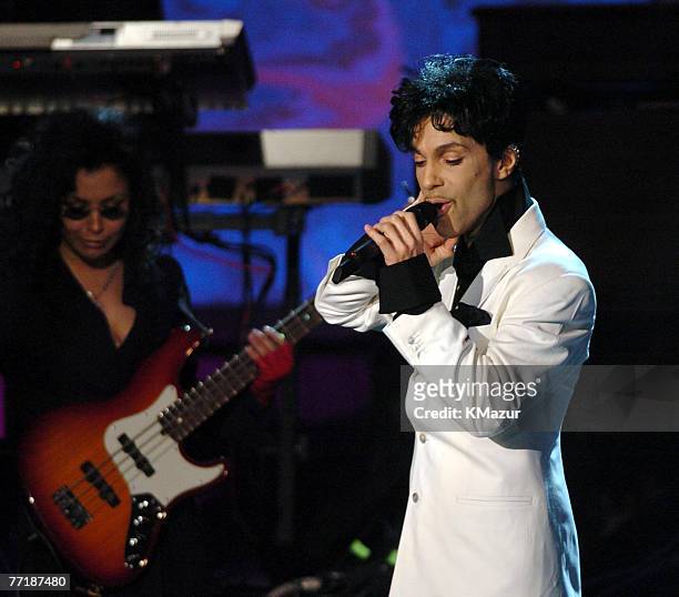 Prince performs after being inducted into the Rock and Roll Hall of Fame