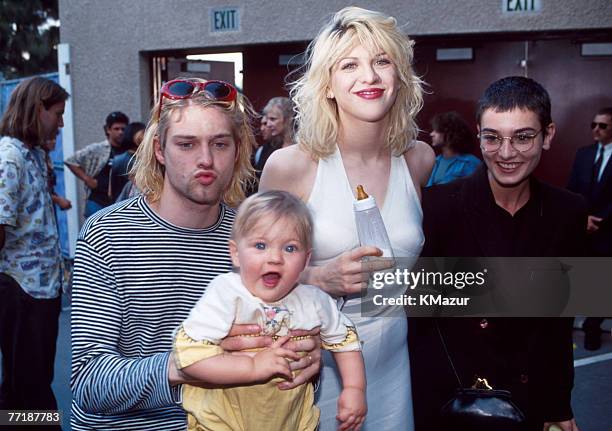 Kurt Cobain of Nirvana with wife Courtney Love and daughter Frances Bean Cobain, and Sinead O'Connor