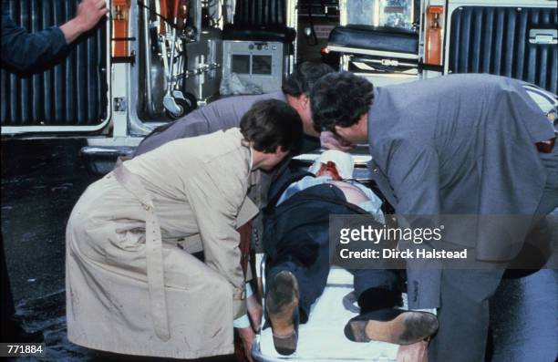 Press Secretary James Brady is placed into an ambulance on March 30, 1981 shortly after John Hinkley's attempt to assassinate President Reagan...