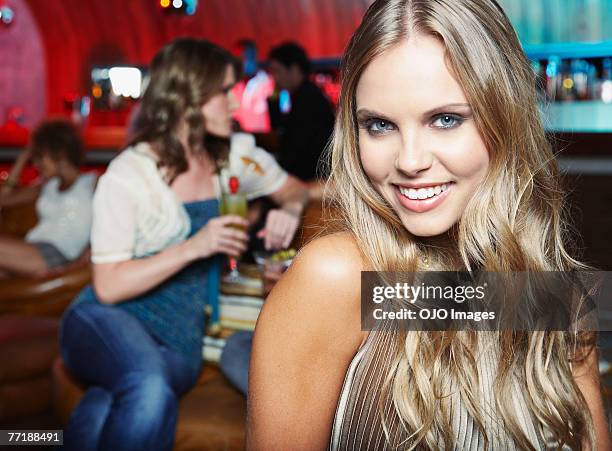 a woman at a bar - adult glamour stock pictures, royalty-free photos & images