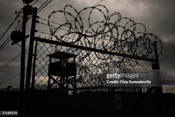 Camp X-Ray, the first detention facility to hold "enemy combatants" at the U.S. Naval Station at Guantanamo Bay, stands vacant and overgrown October...