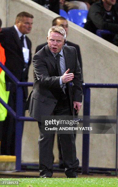 Bolton Wanderers manager Sammy Lee talks to his players during the UEFA Cup first round second leg football match against Rabotnicki Kometa at The...