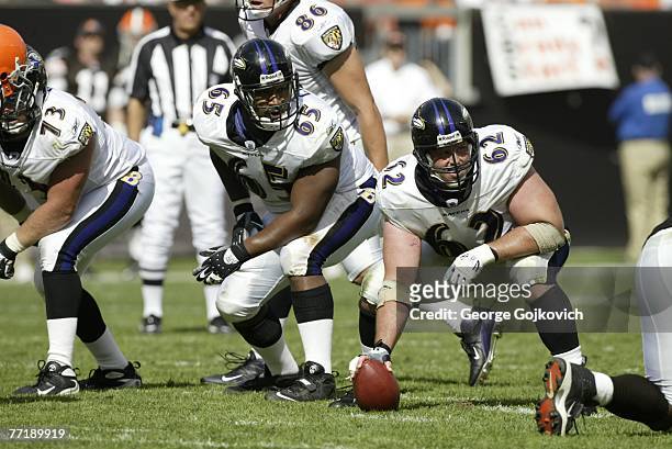 Center Mike Flynn and offensive guard Chris Chester of the Baltimore Ravens prepare to block against the Cleveland Browns at Cleveland Browns Stadium...