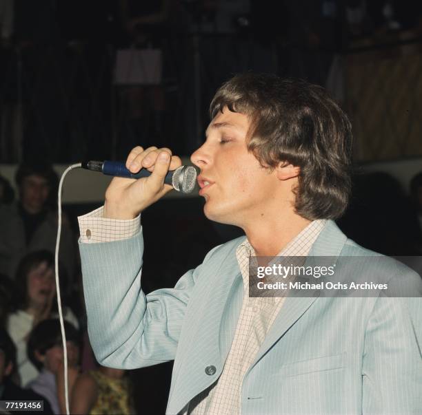 Scott Engel of The Walker Brothers sits in on the drums in June 1965 in London England.