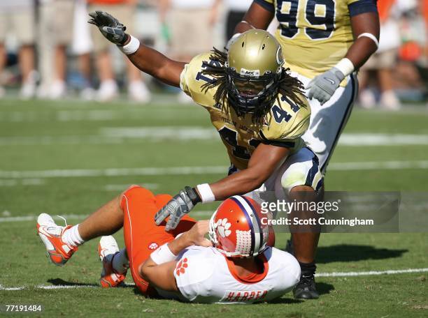 Philip Wheeler of the Georgia Tech Yellow Jackets finishes a tackle against the Clemson Tigers at Bobby Dodd Stadium on September 29, 2007 in...