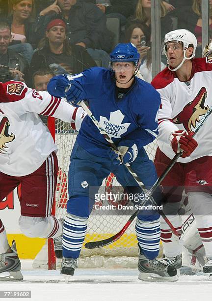 Nick Boynton of the Phoenix Coyotes vies for slot position with Jiri Tlusty of the Toronto Maple Leafs during their NHL preseason game at the Air...