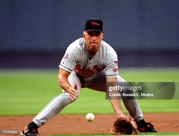 Cal Ripken Jr. #8 of the Baltimore Orioles fielding against the Atlanta Braves during a MLB game on June 14, 1997. In Atlanta, Georgia.